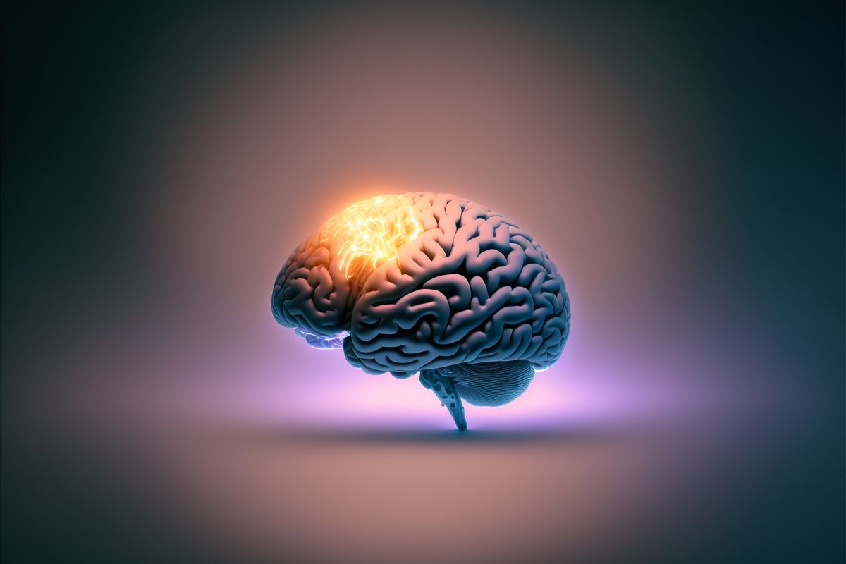 Computer-generated render of a glowing brain on a dark background